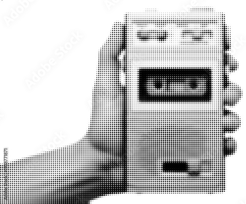 Retro Media Player in Hand: A nostalgic black and white image showcases a vintage media player held by a person's hand, evoking memories of simpler times and the joy of personal music.