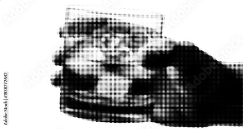 Cool Refreshment: A close-up shot of a hand holding a glass filled with ice cubes and water, creating a cool and refreshing atmosphere. 