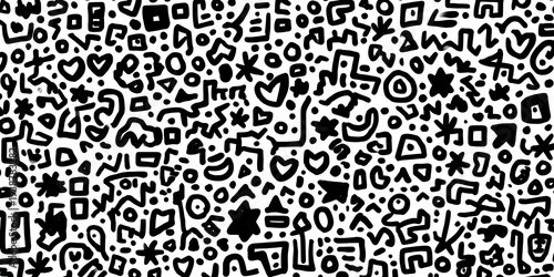 A busy, abstract pattern of small black shapes on a white background