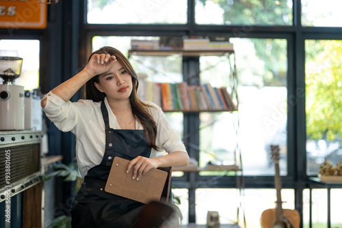 Bilde på lerret Young barista experiencing burnout and stress at coffee shop