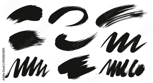 Collection of Black Ink Brush Strokes and Smears on White Background.
