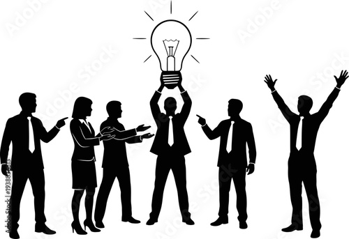 Innovative team celebrating a new idea with lightbulb symbol