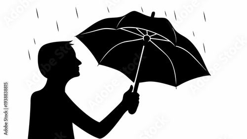 Silhouette of a person holding an umbrella in the rain