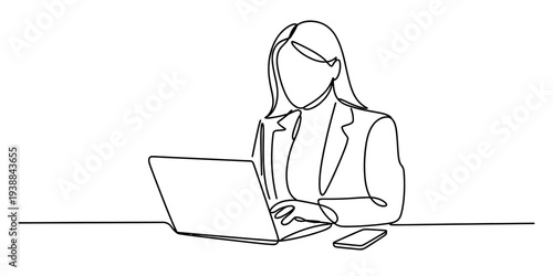 Businesswoman Working on Laptop Computer at Office Desk With Phone