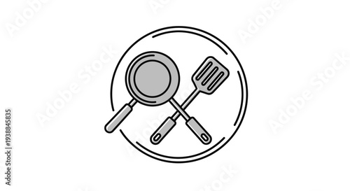 Frying Pan and Utensils on Plate.