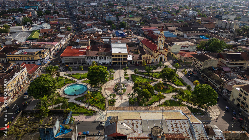 Fototapeta premium Panoramic aerial drone view of the main square of Iquitos with the historic Catedral de Iquitos in the heart of the Peruvian Amazon, vibrant tropical city known for culture history, travel and tourism