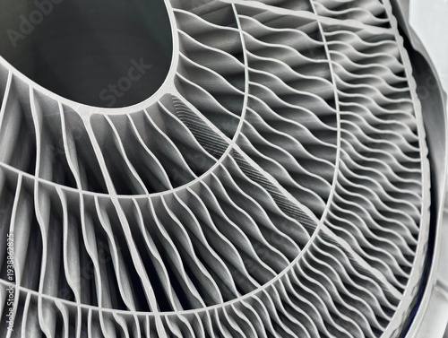 Additive manufacturing process showcasing metal products created through advanced 3D printing techniques in an industrial setting