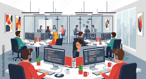 Office workers collaborating at computer workstations together.