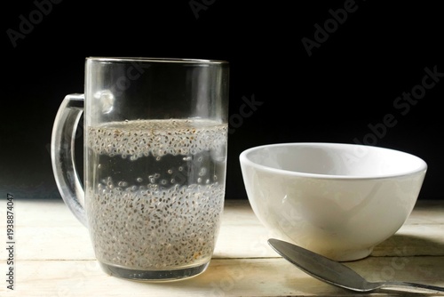 chia seeds in a glass of water on the table
