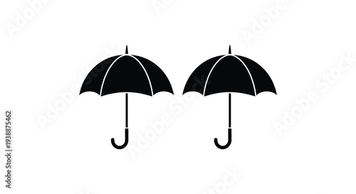 Two closed black umbrellas are displayed against a stark white background forming a striking silhouette high quality professional