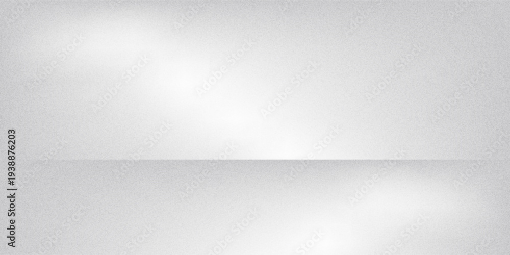 Obraz premium A minimalist white and grey wall interior background with soft window shadows. Ideal for studio backdrops, product presentations, and text insertions, creating a clean and modern aesthetic.