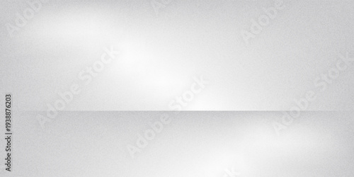 A minimalist white and grey wall interior background with soft window shadows. Ideal for studio backdrops, product presentations, and text insertions, creating a clean and modern aesthetic.