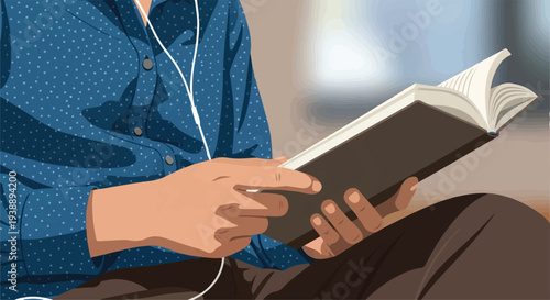 A person wearing headphones reads a book while sitting comfortably indoors, immersed in their quiet activity