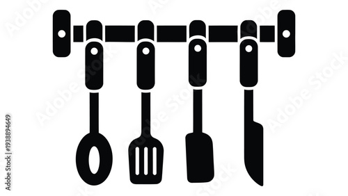 Black kitchen utensil hook rail with hanging tools on wall