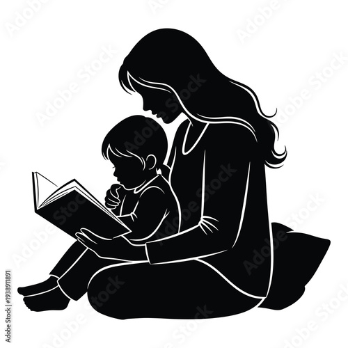 Mother reading to child sitting together on floor in silhouette
