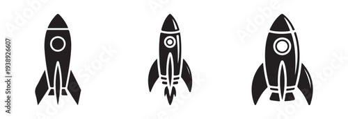 Group of three iconic spaceship shapes in solid black solid fill perfect for space exploration theme graphics