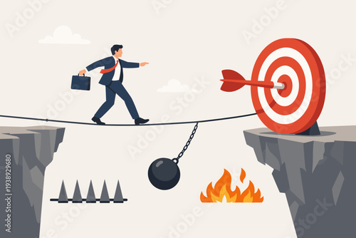Businessman walking on a tightrope over a chasm with spikes, fire, and a wrecking ball to reach a target, representing business challenge, risk management, strategy, skill, and goal achievement.