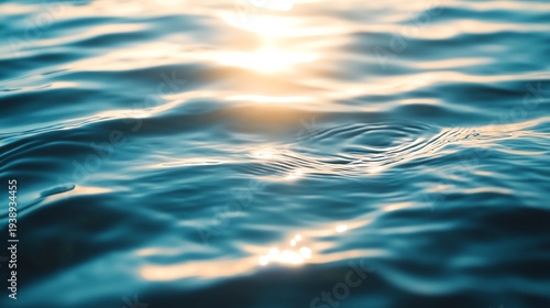 Rippling water surface reflecting sunlight, creating a serene and calming atmosphere.