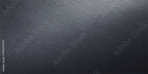 Dark gray brushed metal surface with diagonal scratches and soft light, industrial backdrop for heavy industry or technology themes