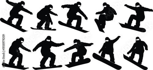 A group of snowboarders in various dynamic poses