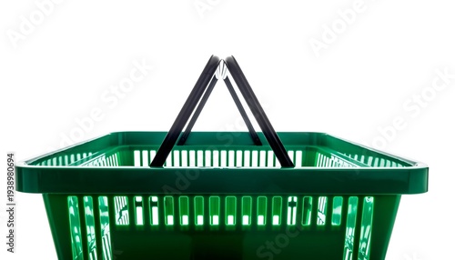 Green shopping basket close-up with black handles, white background