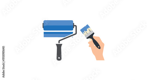 Hand holding paintbrush with blue paint and roller for home renovation