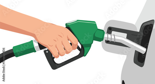Hand holding green fuel nozzle refueling a vehicle at a gas station