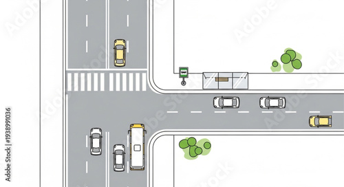Aerial view of a city intersection with cars and a bus.