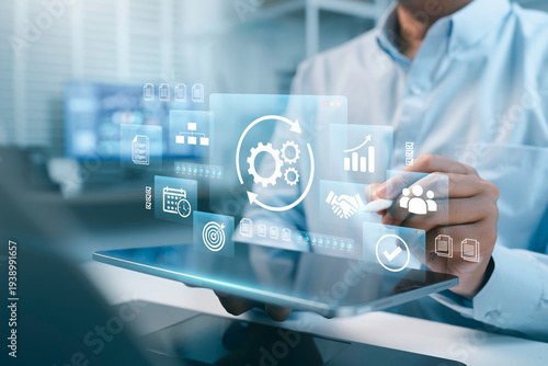 Businessman developing digital automation system and AI workflow optimization, Concept of process management, operational efficiency, business technology, and digital transformation strategy