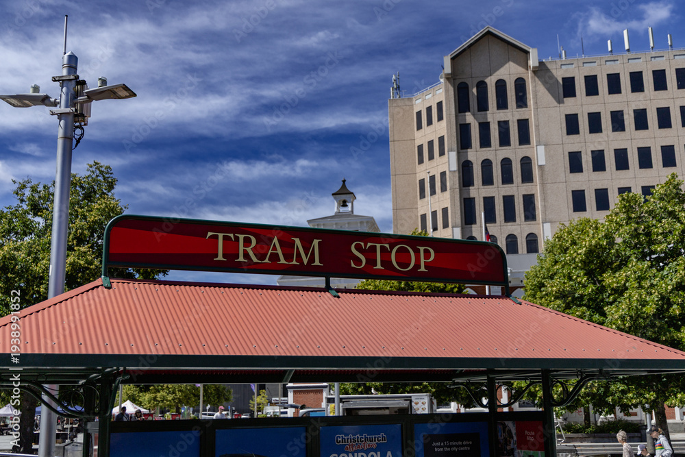 Obraz premium Tram Stop Urban Shelter Beside Office Building
