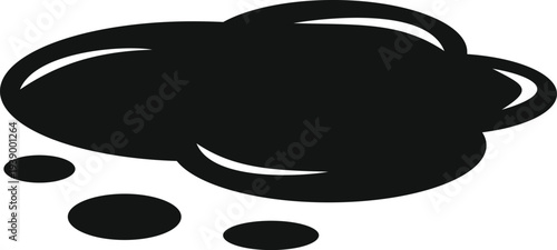 Black liquid forming a slick puddle and smaller droplets on a white background