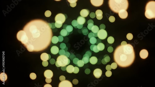 Pink and peach bokeh circles on a black backdrop, creating a blurred, abstract, and festive scene