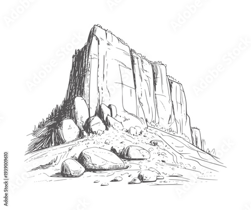 Black and white of a large cliff face with rocks and trees mountain nature monochrome