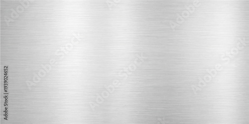 Abstract a close-up image showcases a textured metallic surface with a brushed finish, offering a visual display of industrial design and sleek material composition.