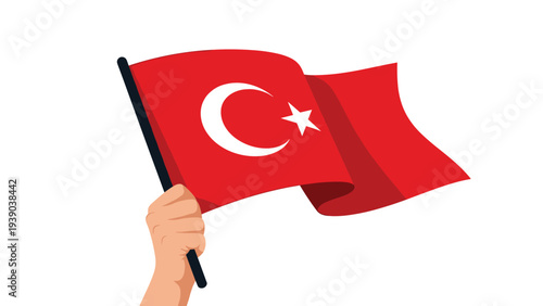 Human hand waving the national flag of Turkey with its iconic white crescent moon and star on a bright red background field.