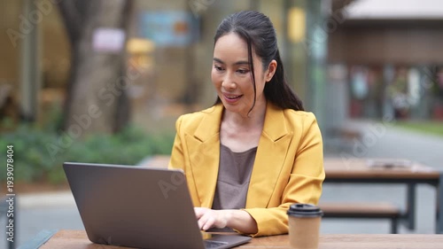 Female businessman working with smart phone and laptop and digital tablet computer.