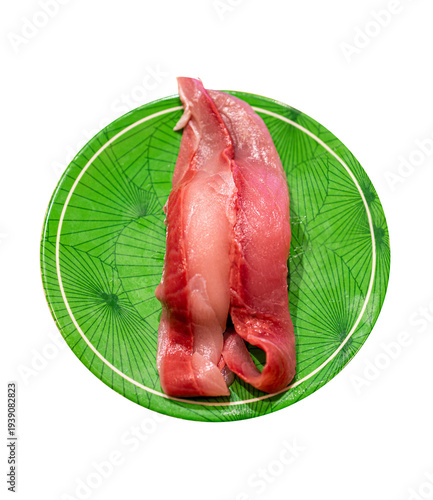 Top view of Fresh Tuna fish or Otoro with chopsticks in the red plate, focus selective