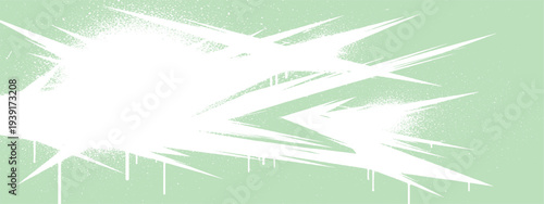 Explosive abstract graphic with sharp shards and spray paint effect on light green background