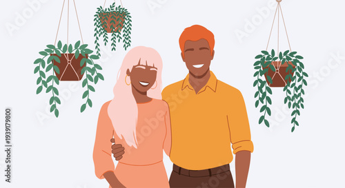 Portrait of a happy multiracial couple smiling together indoors surrounded by lush green hanging plants in a bright living environment.