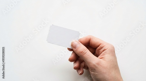 Wallpaper Mural Hand holds blank card beautifully against white subtly. Torontodigital.ca