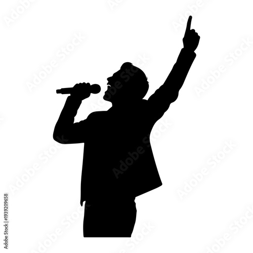 Silhouette of a Singer Performing on Stage with Microphone.