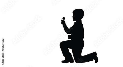 A young man proposing to his partner in a dramatic silhouette