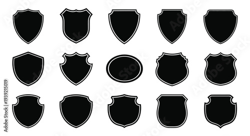 Collection of diverse black shield shapes presented as a dramatic silhouette