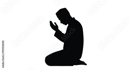 Silhouette of a muslim man in prayer hands raised to heaven