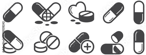 Dark gray silhouette icons of pills and capsules medicine