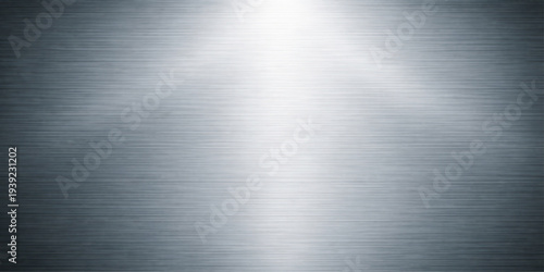 Abstract a textured stainless steel surface gleams under directional light, creating a sense of cool industrial beauty, evoking a feel of the cold metal.