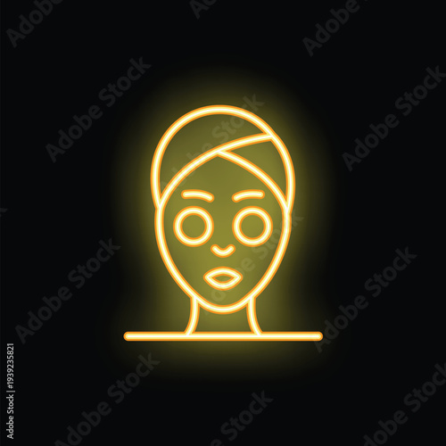 Neon sign of a woman wearing a towel enjoying a spa treatment with a facial mask