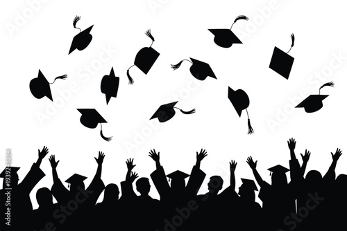 Silhouette of Graduates Throwing Hats in Celebration