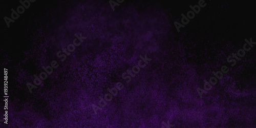Freeze motion explosion of purple powder dust on a black background. abstract background with a textured gradient effect, suitable for wallpapers or graphic designs. Purple Smoke Cloudscape Texture.