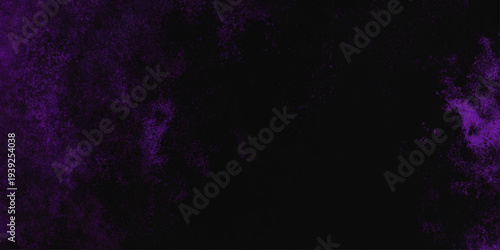 Freeze motion explosion of purple powder dust on a black background. abstract background with a textured gradient effect, suitable for wallpapers or graphic designs. Purple Smoke Cloudscape Texture.